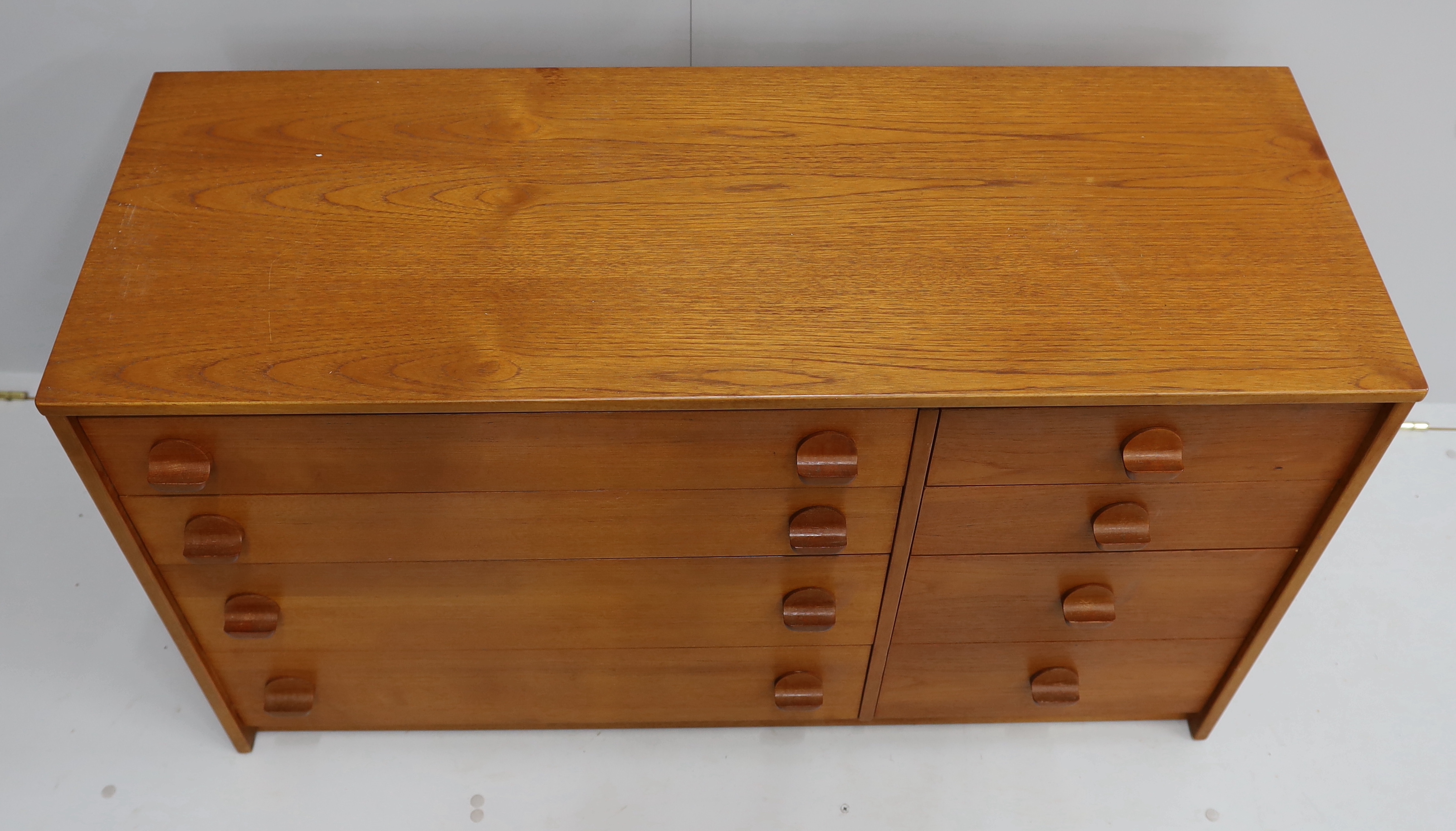 Ron Carter for Stag Furniture - A 'Cantata' teak chest of eight drawers, width 118cm, depth 44cm, height 69cm